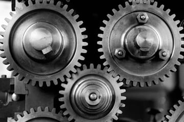 Free Silver Metal Round Gears Connected to Each Other Stock Photo